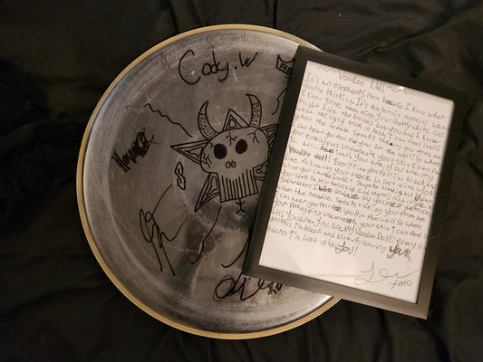 The funeral portrait drum head and lyric sheet
